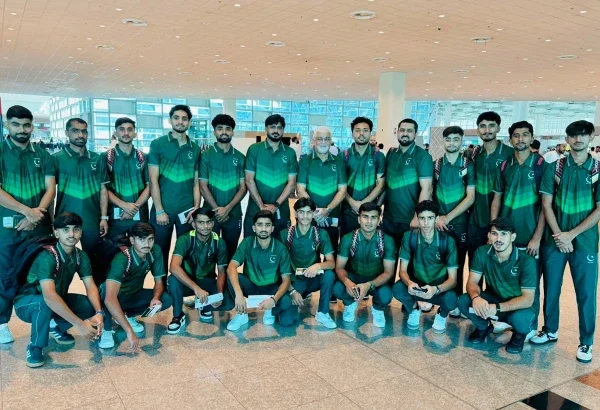 Pakistan Under-21 hockey team poses before departing for Muscat to play a five-match Test series against Oman.