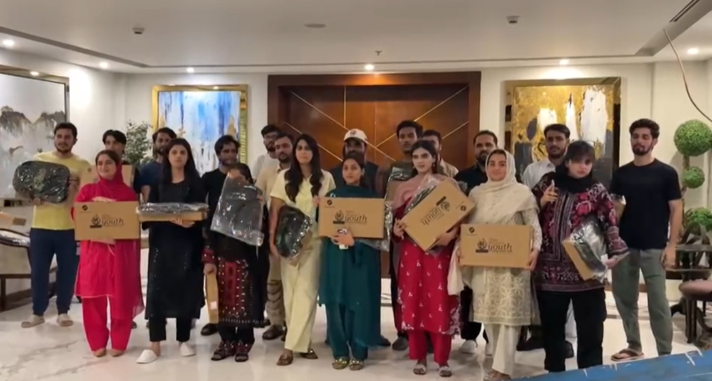 Prime Minister Shehbaz Sharif distributing laptops to students from Balochistan at the Prime Minister House.