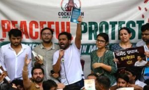 Indian Students Clash With Police During Parliament March Over Education Reform Demands Indian students protesting during a march toward Parliament while police deploy tear gas.