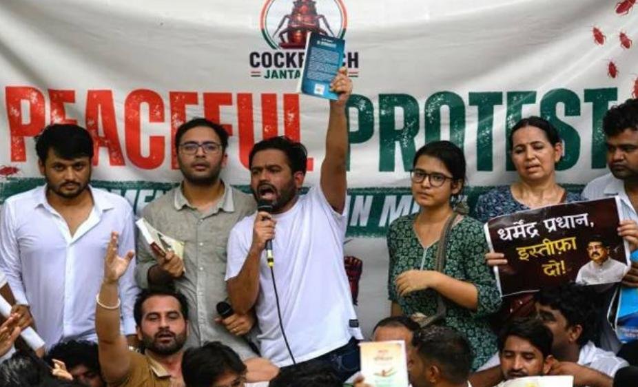 Indian Students Clash With Police During Parliament March Over Education Reform Demands Indian students protesting during a march toward Parliament while police deploy tear gas.