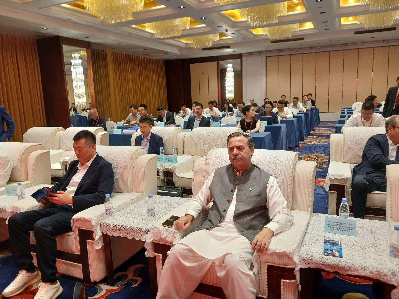 Federal Minister for Maritime Affairs Muhammad Junaid Anwar Chaudhry addressing the Regional Transit Trade Hub Initiative in Beijing.
