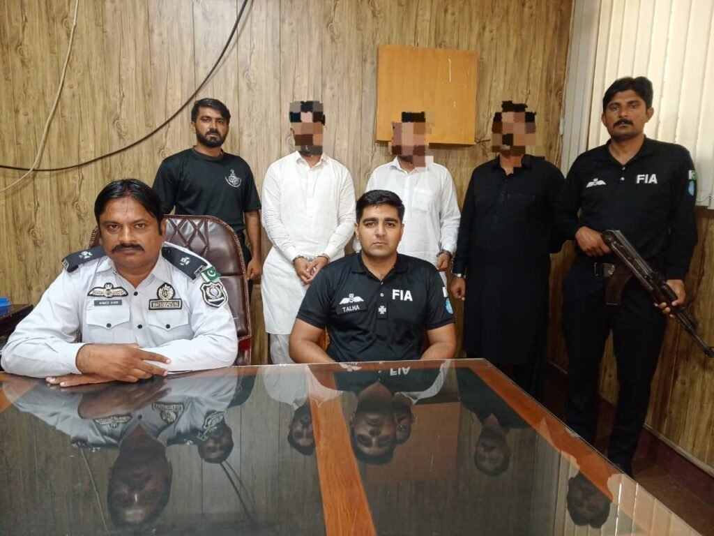 FIA officials conducting raids during a corruption and fake CNIC investigation in Sargodha.