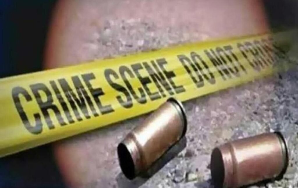 Police investigators at the scene after senior boxer Ahmad Yar was shot dead in Quetta.