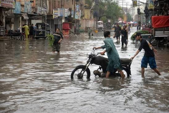 Flooded streets and rescue operations after heavy monsoon rains in Sindh, Pakistan.