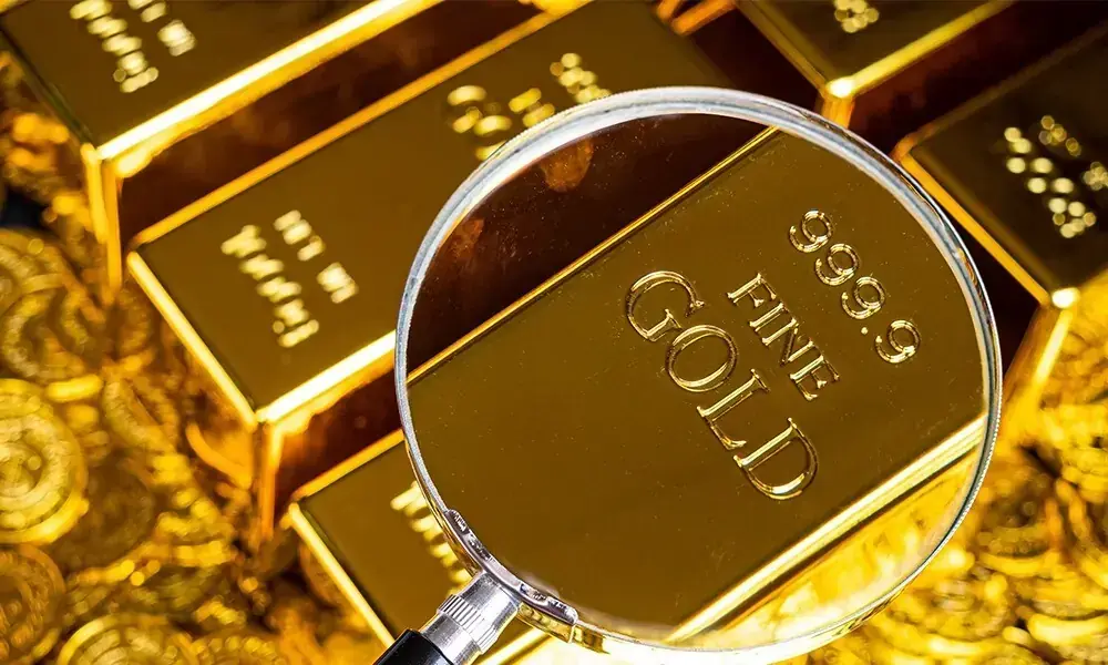 Gold jewellery displayed at a jewellery shop in Pakistan as local gold prices rise.