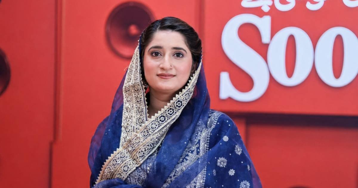 Hira Qaiser holds the Pakistan Idol trophy after winning the singing competition at the grand finale.