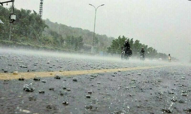 Dark monsoon clouds gathering over Karachi skyline before expected rainfall.