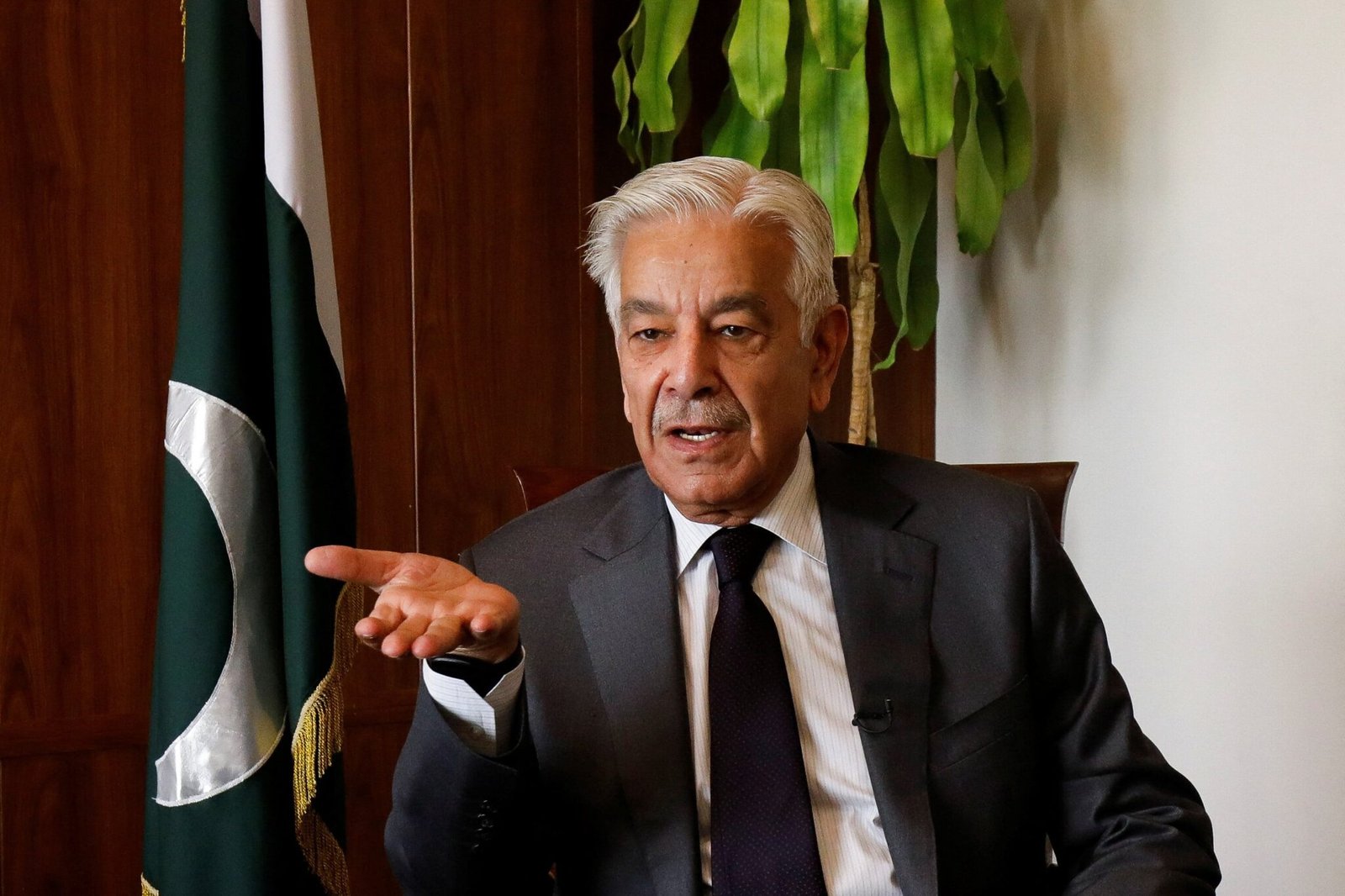 Defence Minister Khawaja Asif addressing a public gathering in Sialkot.
