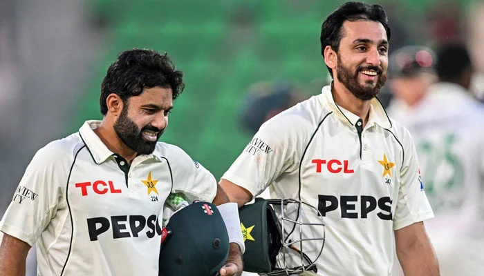 Pakistan cricketers Mohammad Rizwan and Salman Ali Agha during a Test match against England