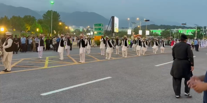 Grand Independence Day City Parade at D-Chowk Islamabad with Pakistani flags and large crowds