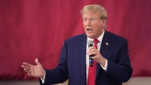 Donald Trump speaking about Iran negotiations and the Strait of Hormuz during a media briefing.