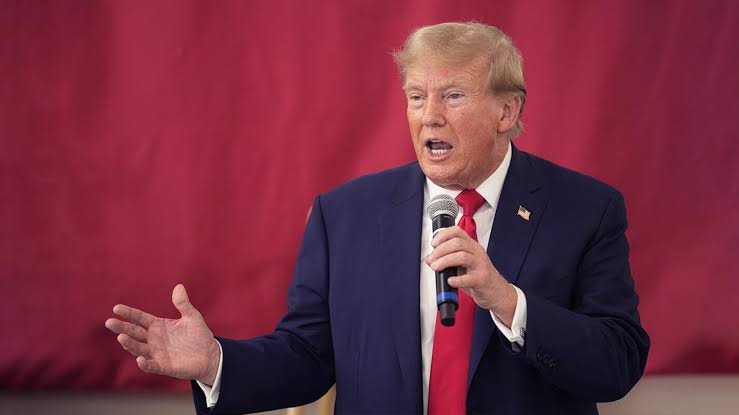 Donald Trump speaking about Iran negotiations and the Strait of Hormuz during a media briefing.