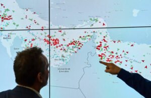 Commercial oil tankers navigating through the Strait of Hormuz amid heightened regional diplomacy.