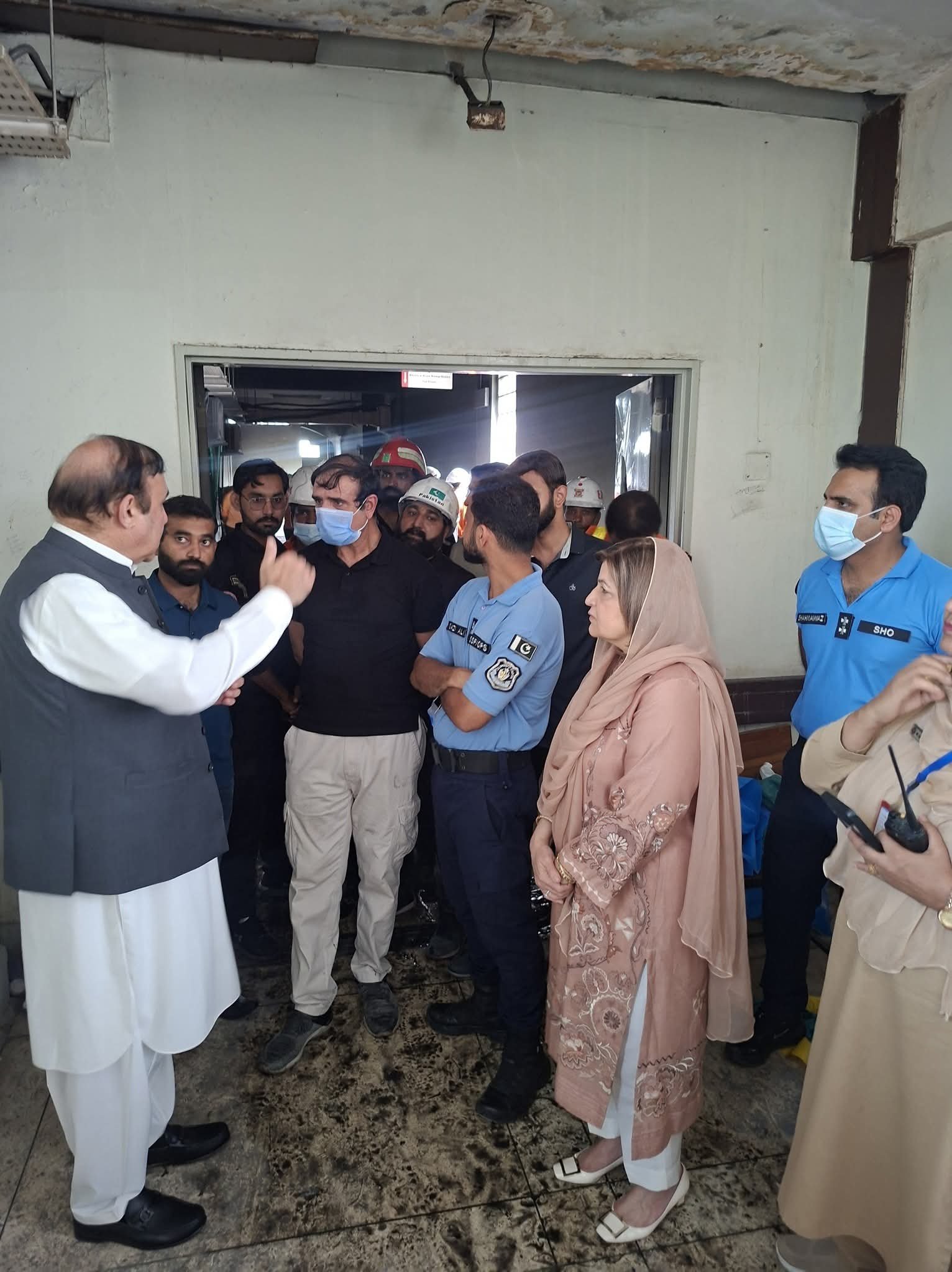 Firefighters and emergency teams outside PIMS after a blaze killed 14 newborns in Islamabad