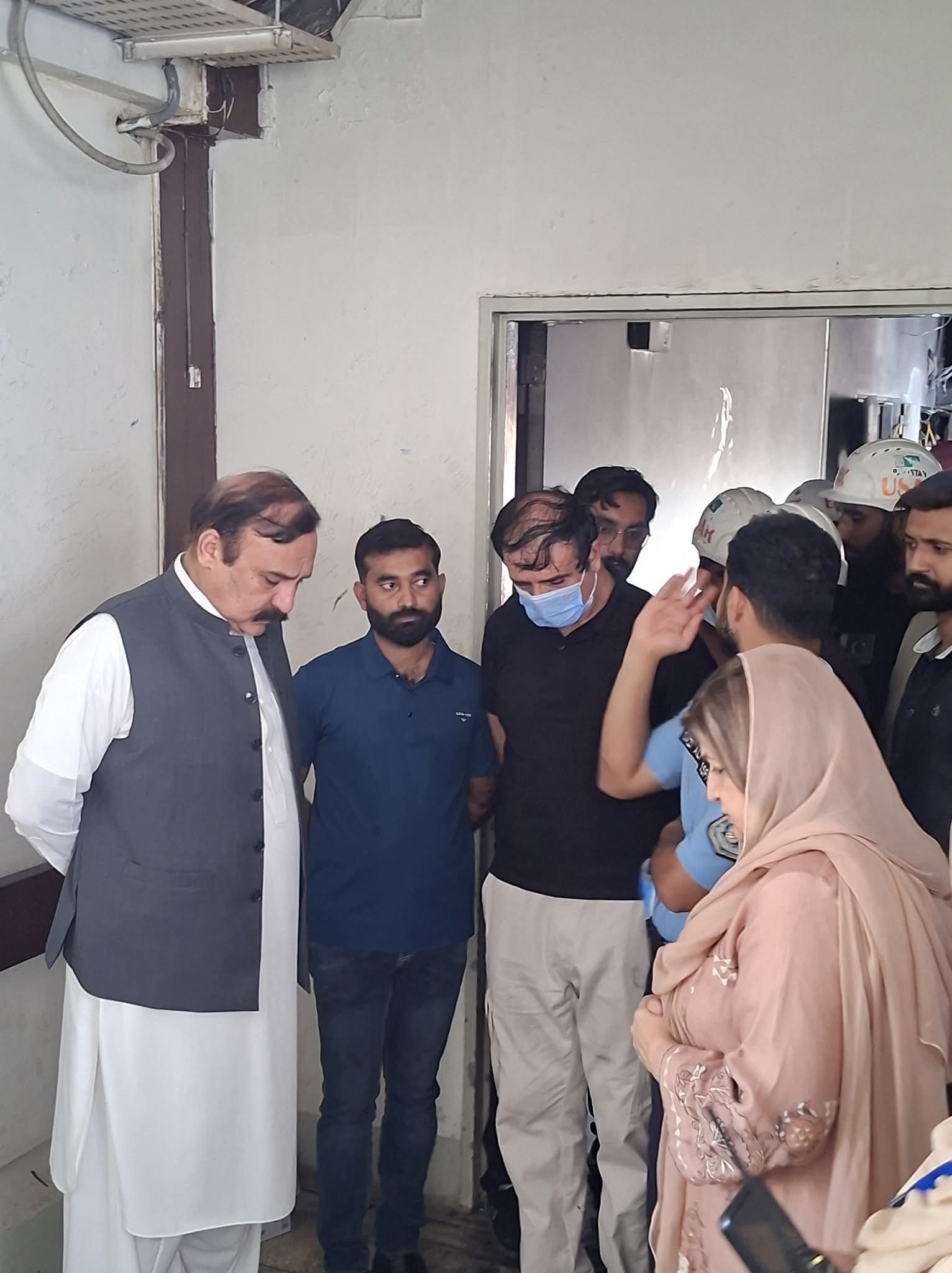 Firefighters and emergency teams outside PIMS after a blaze killed 14 newborns in Islamabad