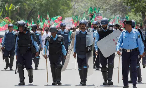22,000 Security Personnel to Be Deployed in Islamabad Ahead of Planned Protests Security personnel and shipping containers positioned in Islamabad ahead of planned protests and marches