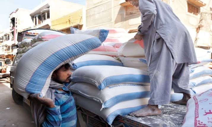 50kg Flour Bag Reaches Rs8,000 as Wheat and Flour Prices Surge Across Pakistan 50kg flour bag and wheat displayed at a Pakistani market as wheat and flour prices rise