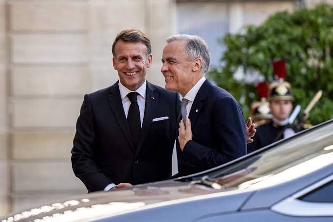 French President Emmanuel Macron and Canadian Prime Minister Mark Carney during a diplomatic meeting in Saint Pierre and Miquelon