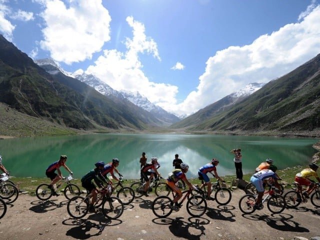 Foreign tourists exploring the mountainous landscape and tourist areas of Naran, Pakistan