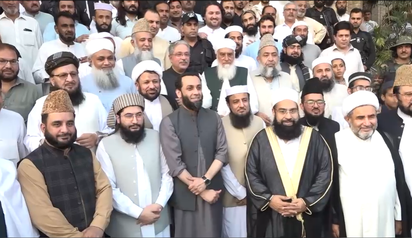 Federal Information Minister Attaullah Tarar meeting religious scholars during his visit to Darul Uloom Haqqania in Akora Khattak