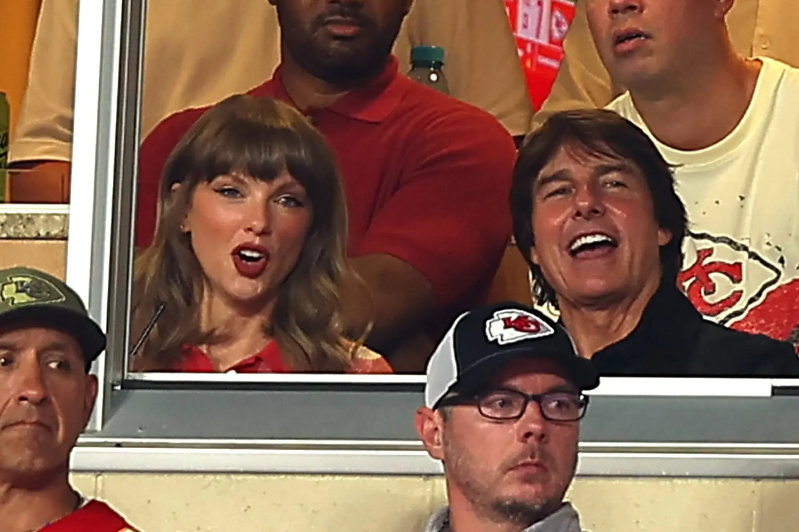 Taylor Swift and Tom Cruise attend the Kansas City Chiefs game at Arrowhead Stadium