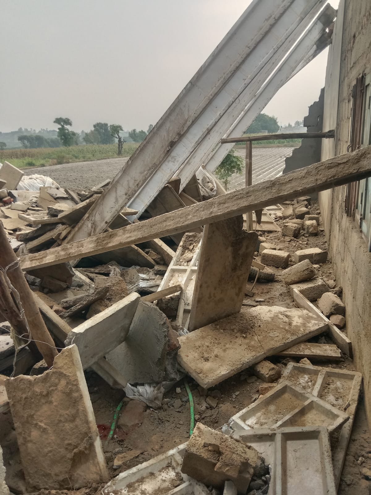 Rescue 1122 personnel rescue injured people after an under-construction madrasa roof collapses in Nowshera