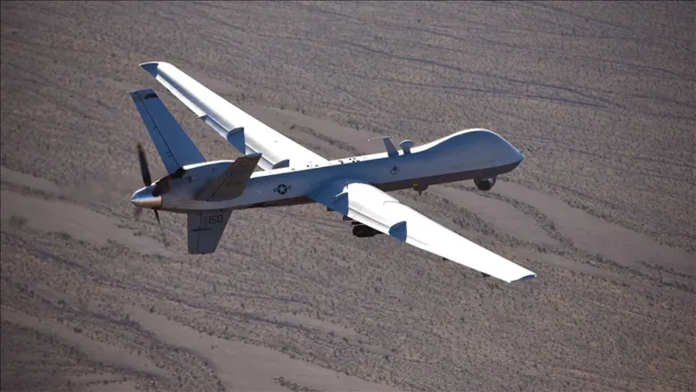 Illustration of a US MQ-9 Reaper drone flying over the Strait of Hormuz amid reported Iranian claims of a drone shootdown.