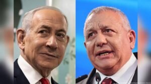 Israeli Prime Minister Benjamin Netanyahu speaking during a political event as preliminary election projections raise questions about coalition formation in Israel.