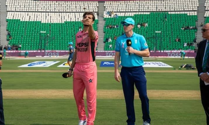 Pakistan cricket players in pink kits during the tri-nation ODI match against England at Gaddafi Stadium in Lahore.