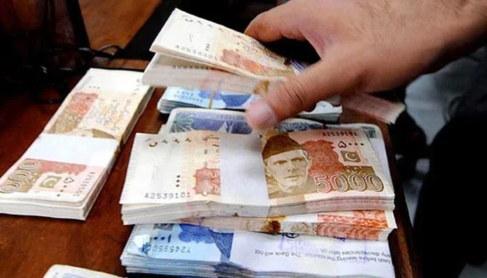 Pakistan's rising public debt interest payments and their impact on government spending and development projects.