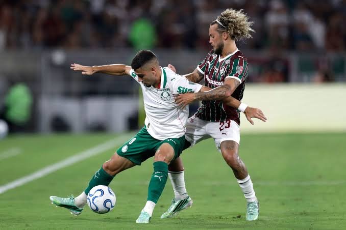 Palmeiras and Fluminense players compete during the Copa Libertadores semi-final first leg at Maracana Stadium.