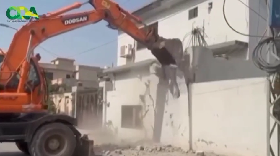 CDA teams conduct an operation against illegal encroachments and unauthorized construction in Islamabad.