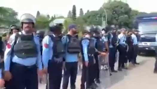 Police personnel, prisoner vans and armored vehicles reportedly deployed near the Prime Minister’s House and Red Zone in Islamabad.