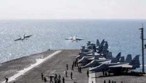 US military aircraft and defence equipment representing the rising cost of the Iran war, with Pentagon estimates exceeding $47 billion.
