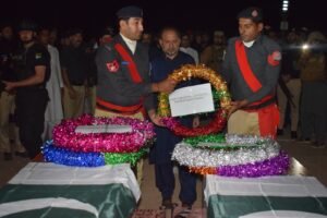 Funeral ceremony in Karak for DSP Imranuddin Khan and three other police personnel martyred during a counterterrorism operation, attended by senior KP police and civil officials.